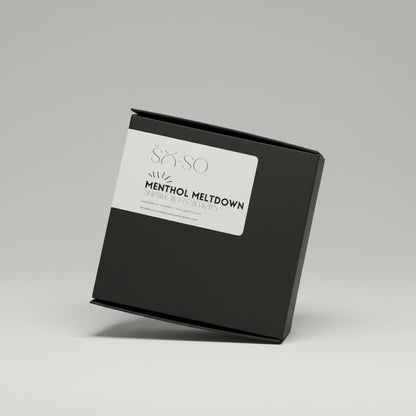 Black box with a white label featuring 'SKIN SO' and 'Menthol Meltdown' on a wooden surface.
