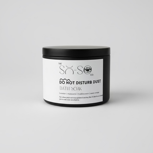 Bath soak container with label on a grey surface